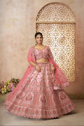 Indian bridal lehenga in pastel pink silk