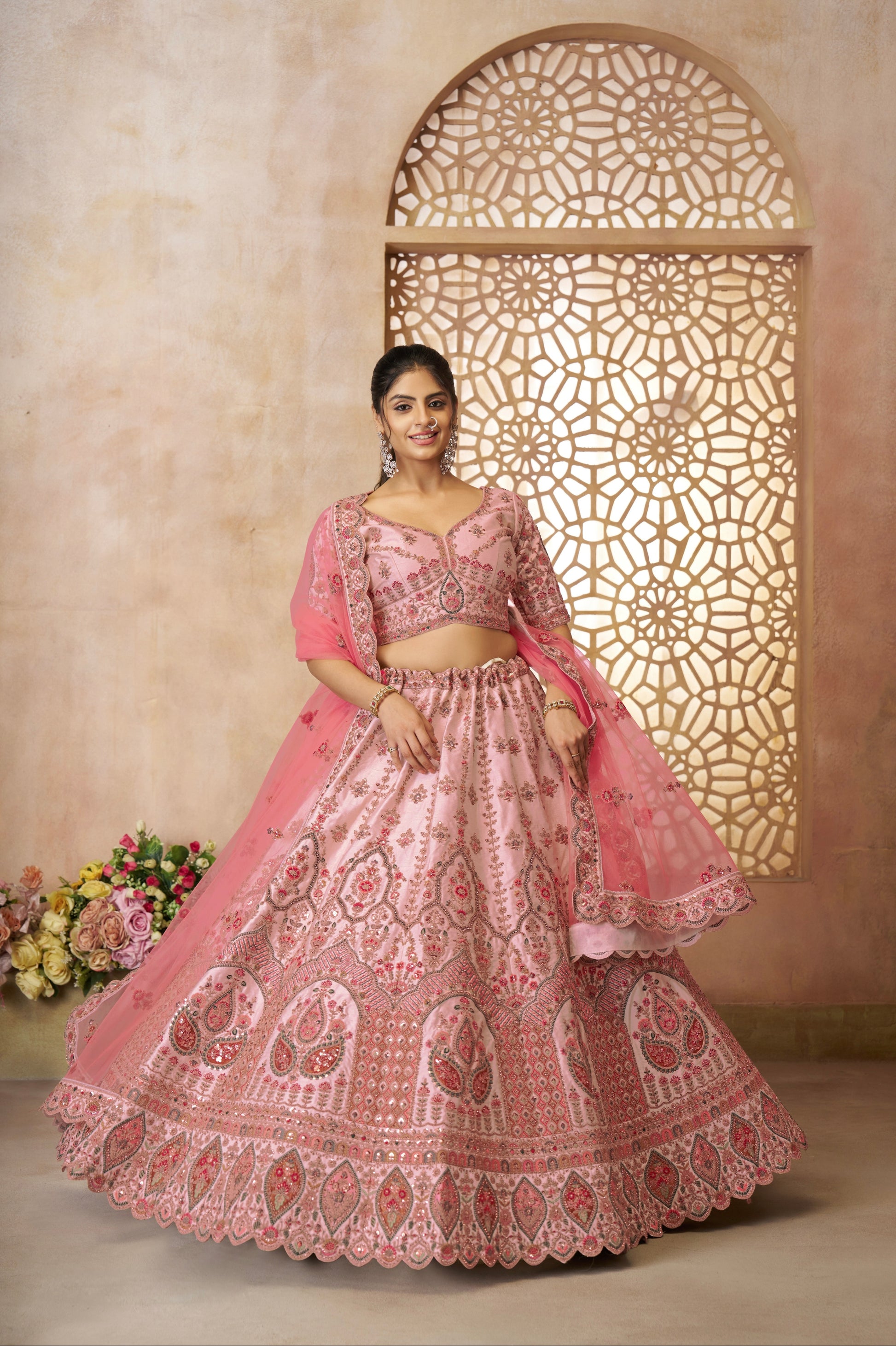 Indian bridal lehenga in pastel pink silk