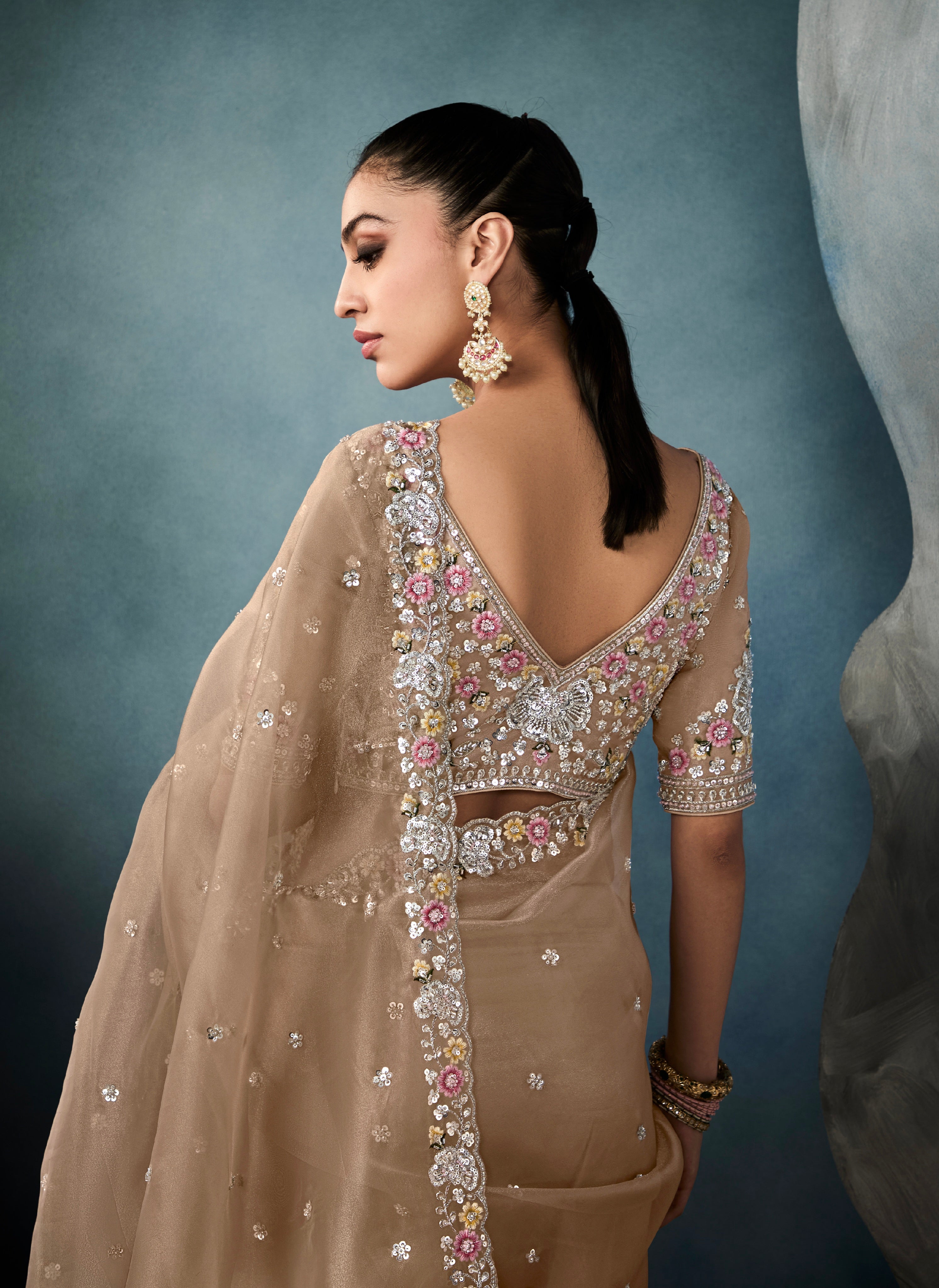 Champagne gold designer tissue saree perfect for festive looks