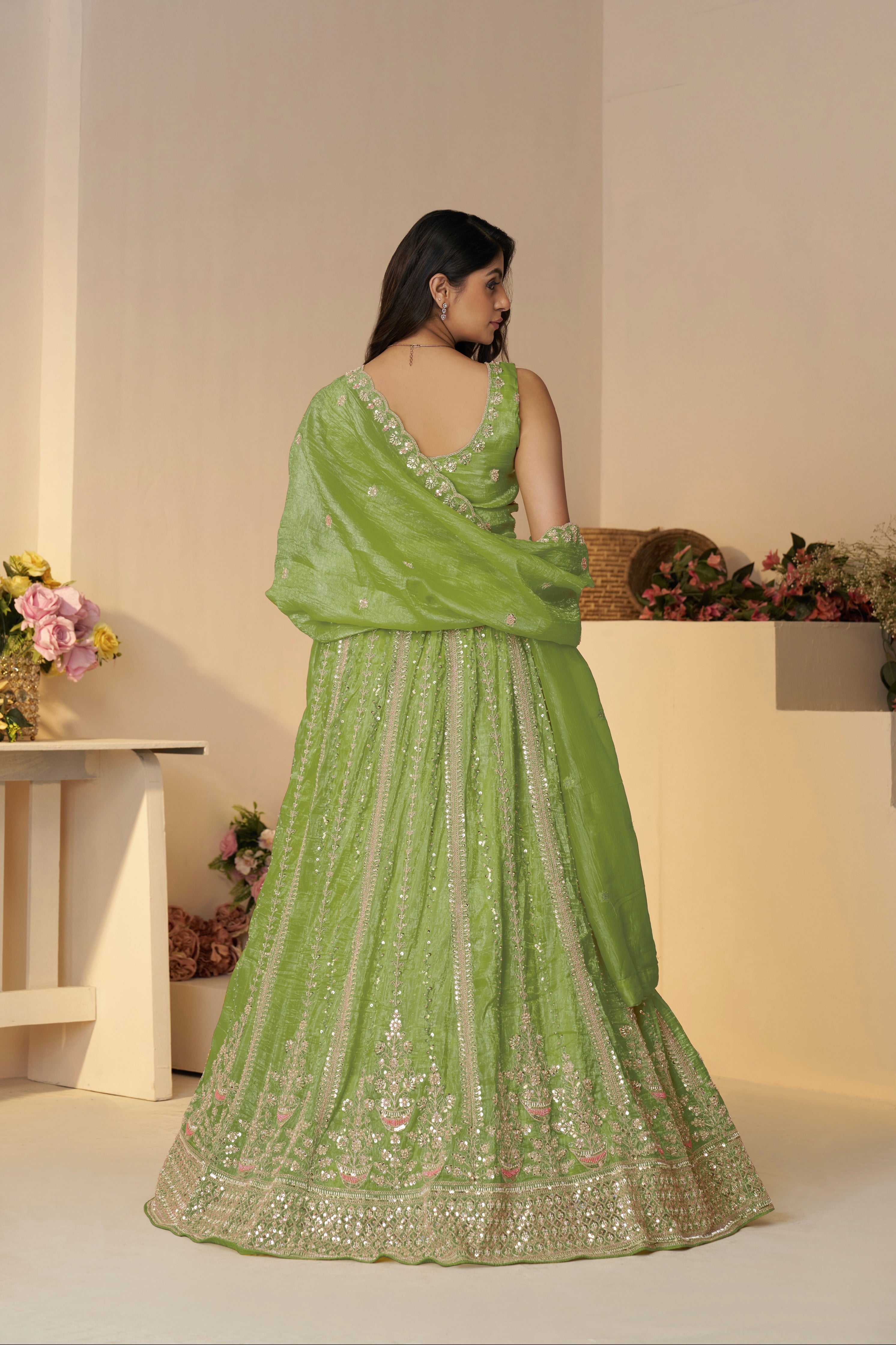 Designer green lehenga with matching dupatta for wedding