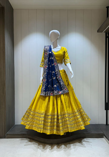 Yellow chaniya choli with blue dupatta