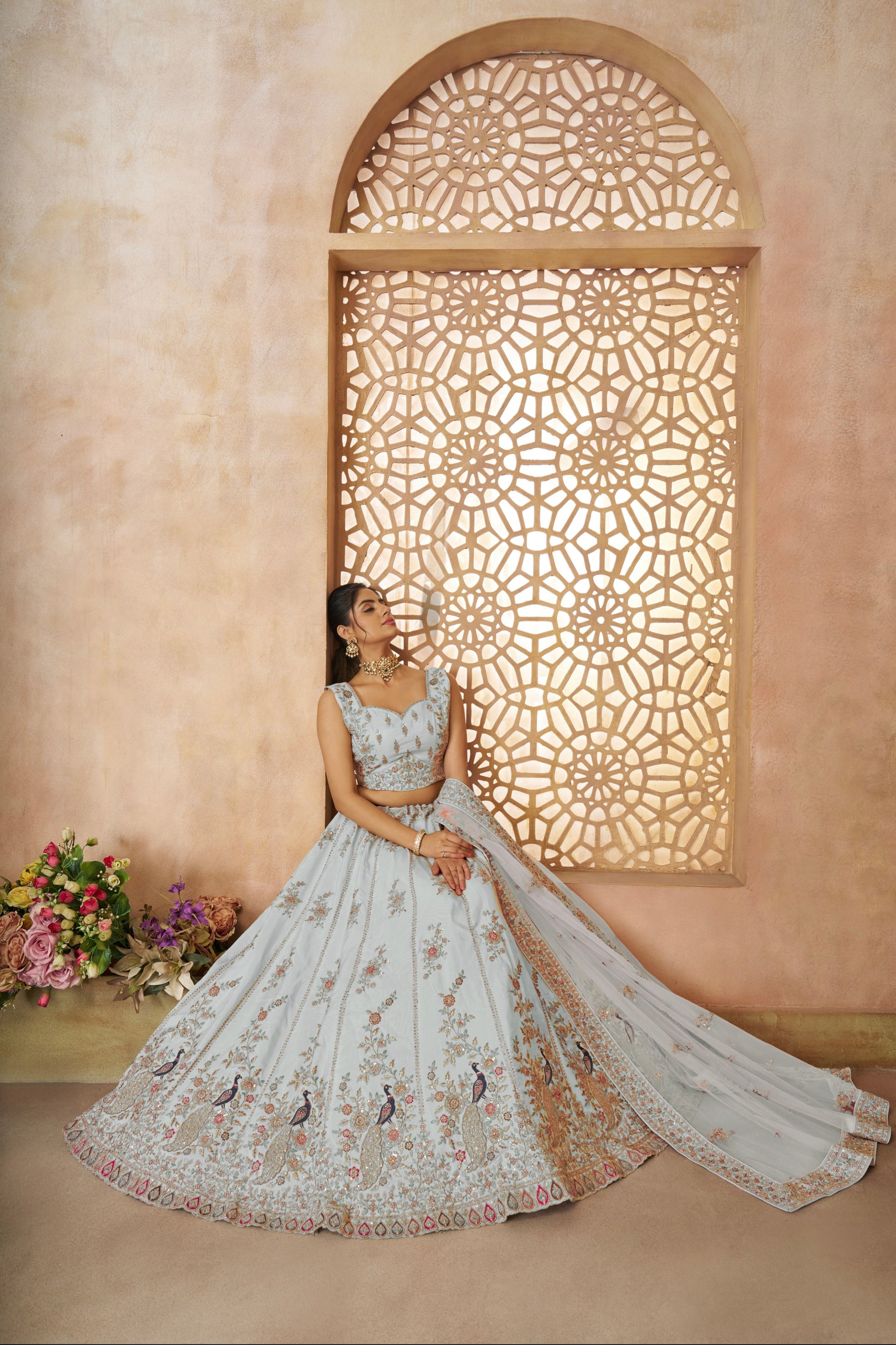 Bridal sky blue lehenga choli set with handcrafted peacock embroidery on silk fabric