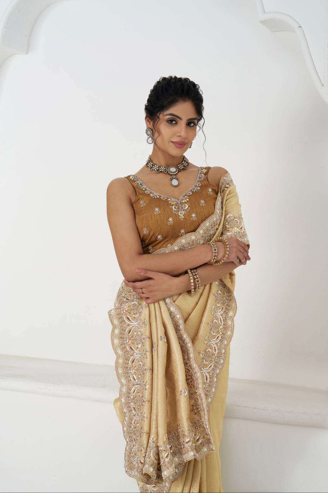 Golden viscose silk saree with embellished border and pallu