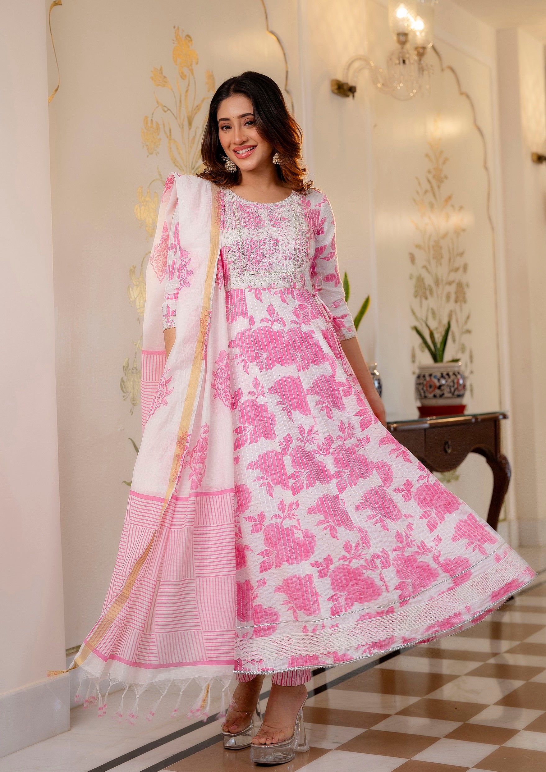 Woman wearing Pink and White Printed Viscose Rayon Kurti, Pant, and Dupatta Set