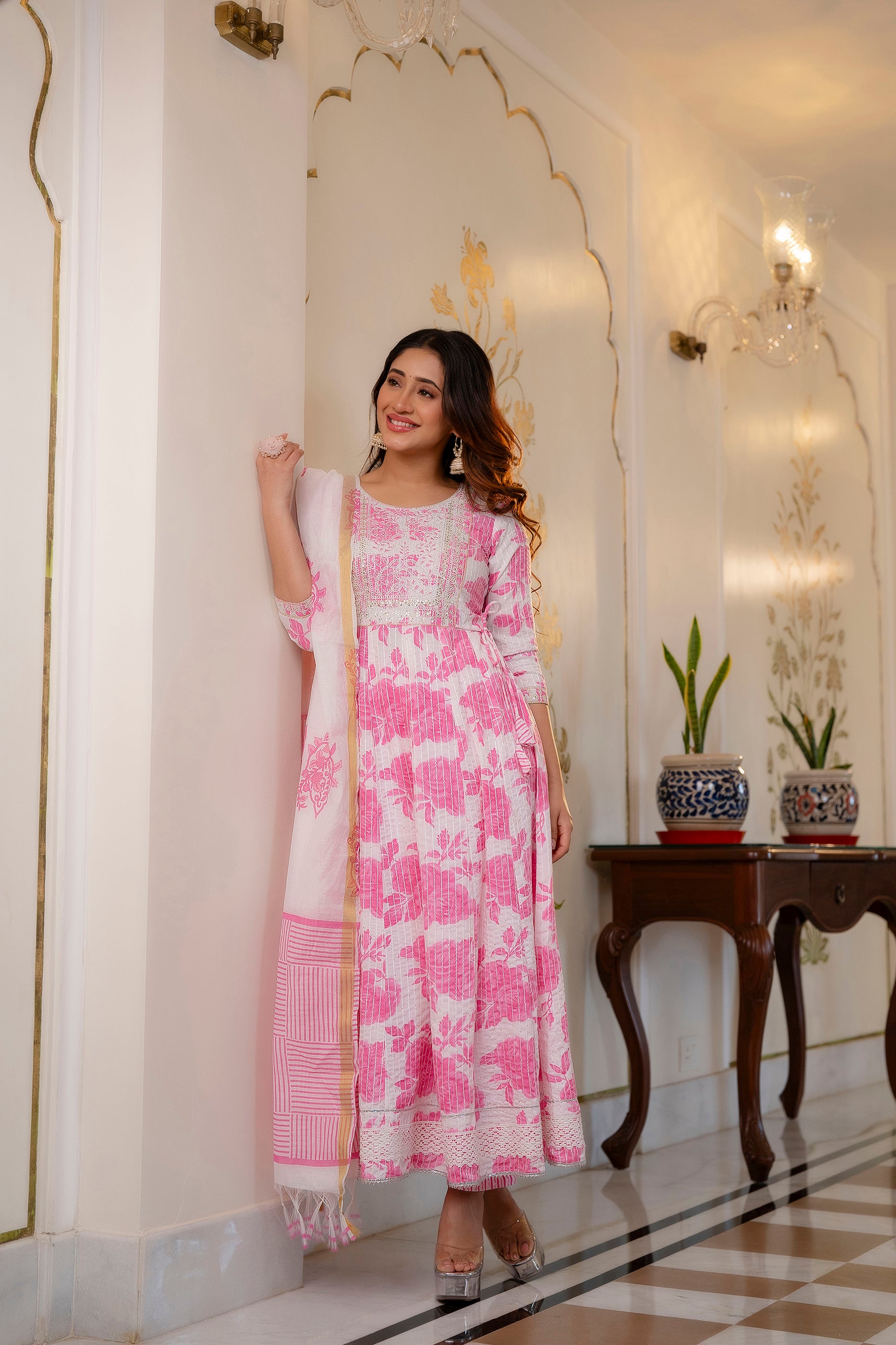 Woman wearing Pink and White Printed Viscose Rayon Kurti, Pant, and Dupatta Set