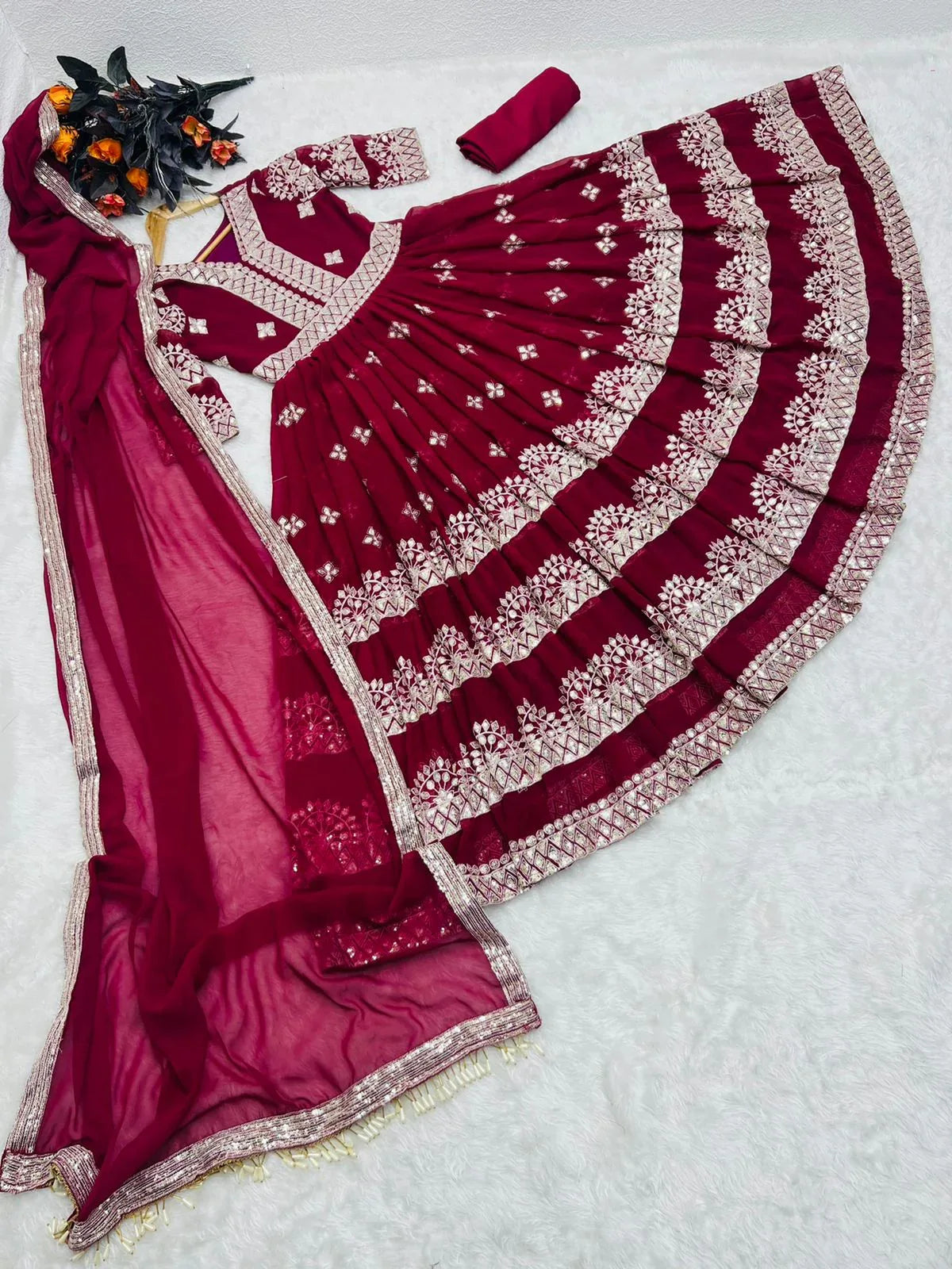 FOX GEORGETTE WITH SEQUENCE EMBROIDERY WORK GOWN Anant Tex Exports Private Limited
