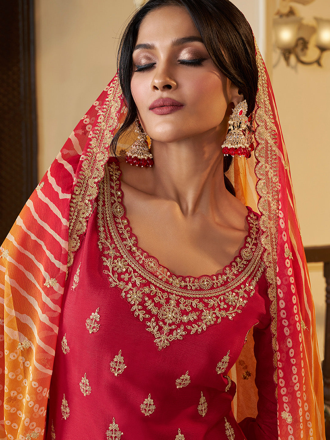 Red festive sharara suit with Bandhej dupatta

