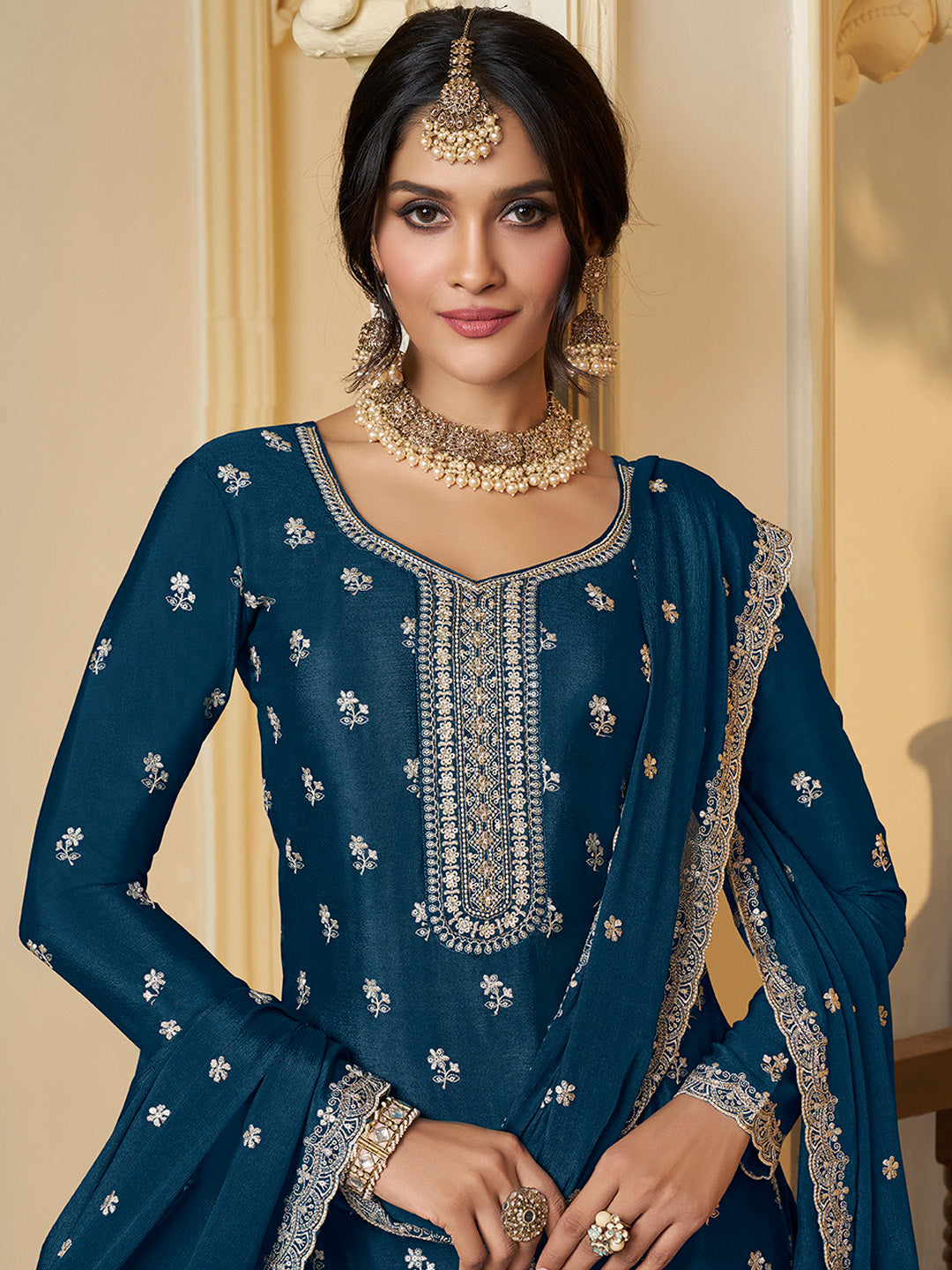 Teal blue sharara suit with white thread and sequin embroidery


