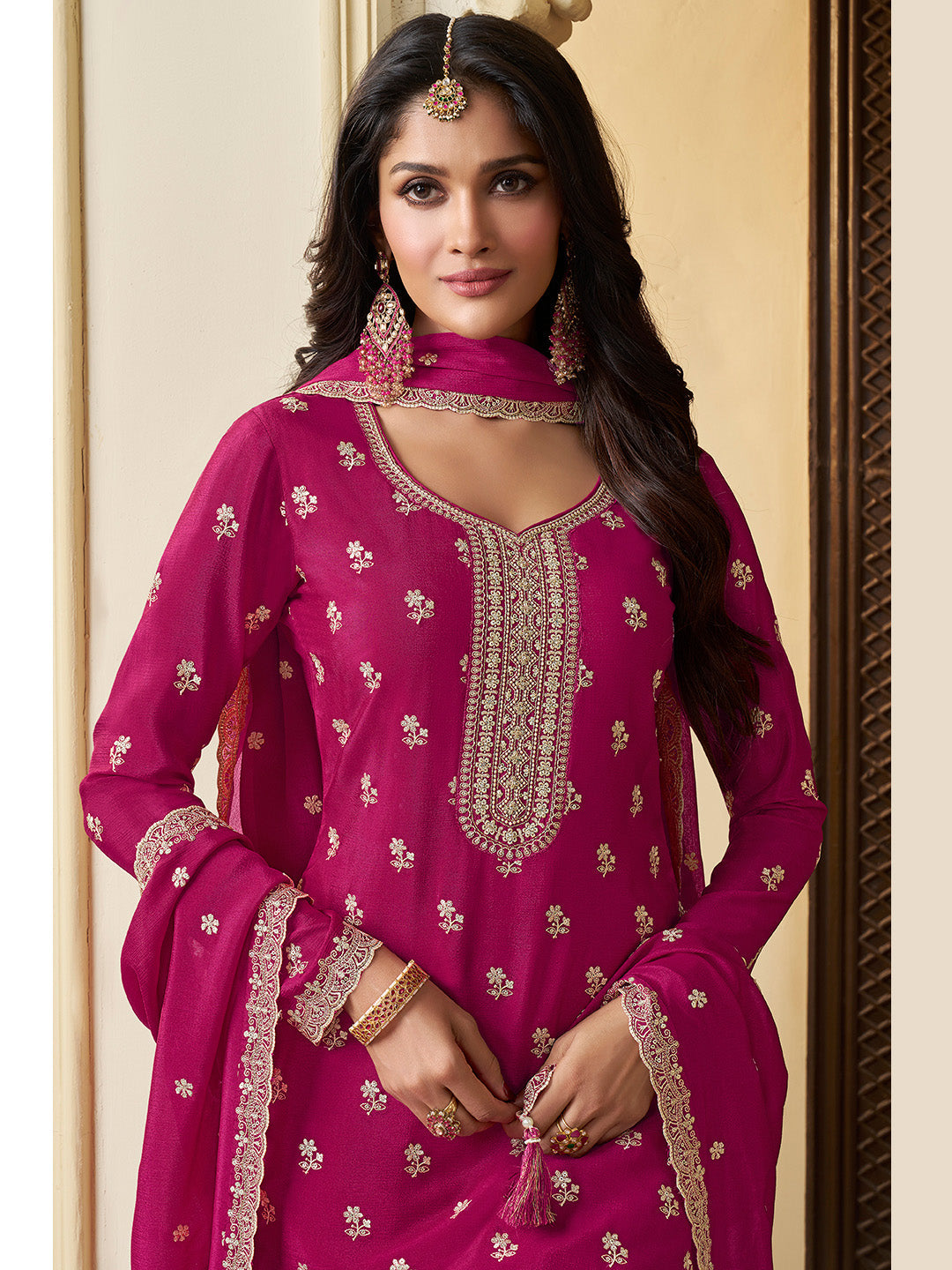 Rani pink sharara suit with white thread embroidery

