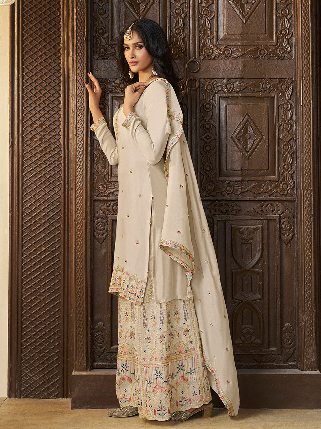 Wedding wear cream sharara suit with scalloped dupatta

