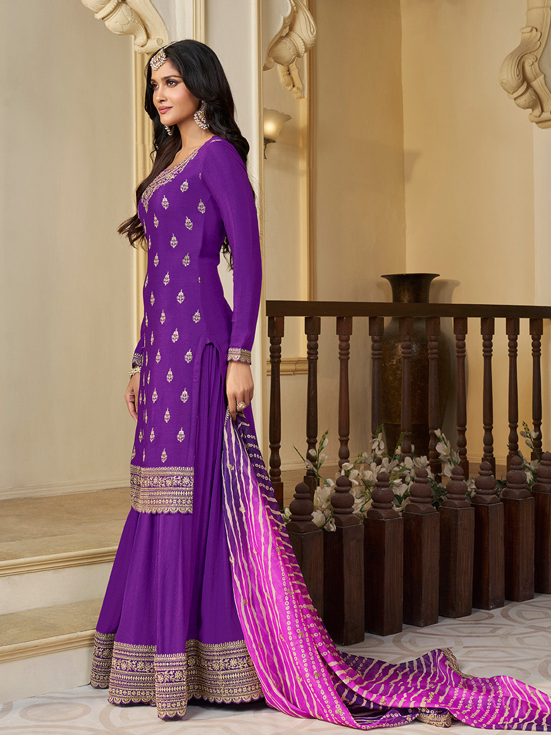 Purple embroidered sharara suit set with heavy detailing

