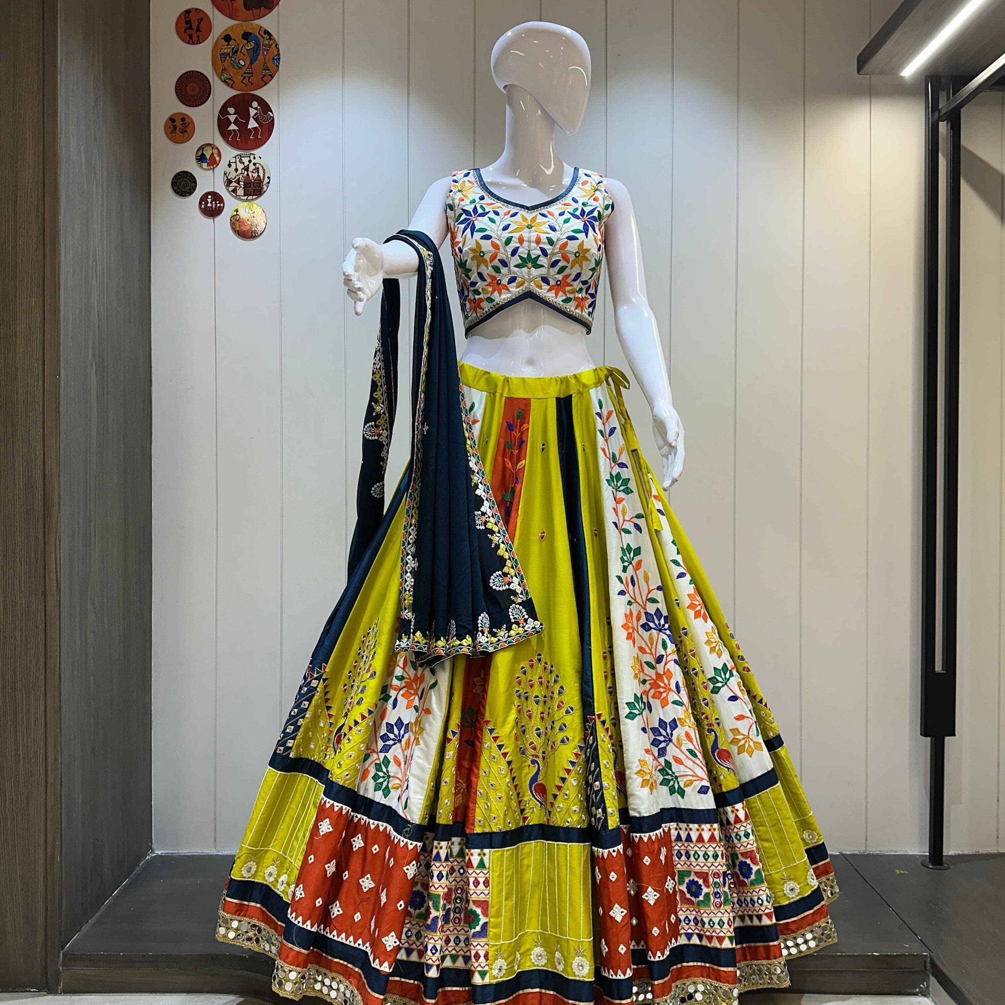 Yellow and navy blue Gamthi work chaniya choli for Navratri
