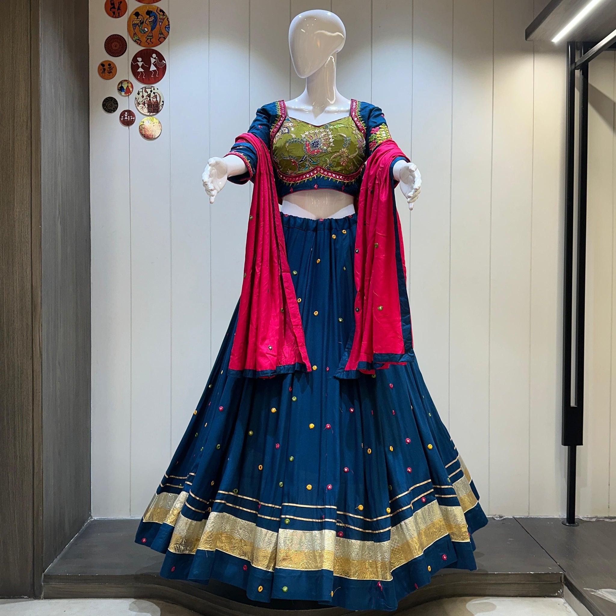 Blue chaniya choli with pink dupatta and gold edging

