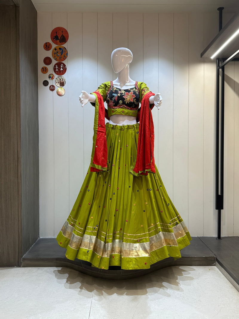 Green chaniya choli with red dupatta and gold hem

