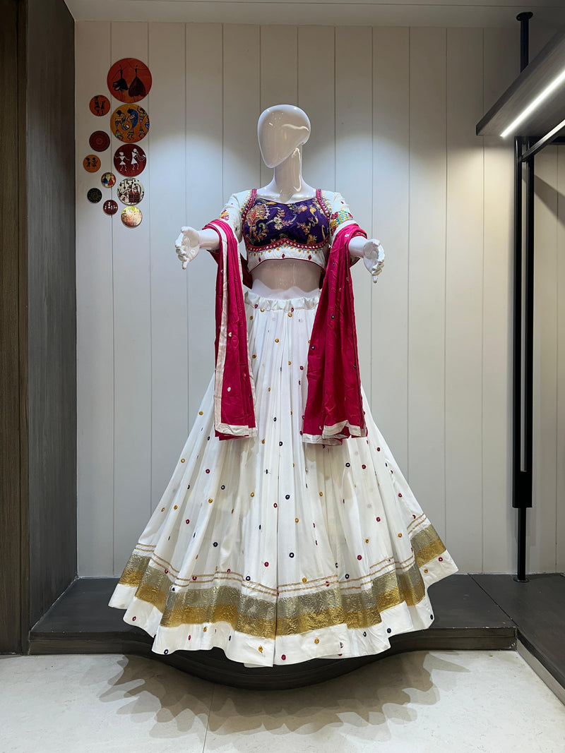 White chaniya choli with red dupatta and gold detailing

