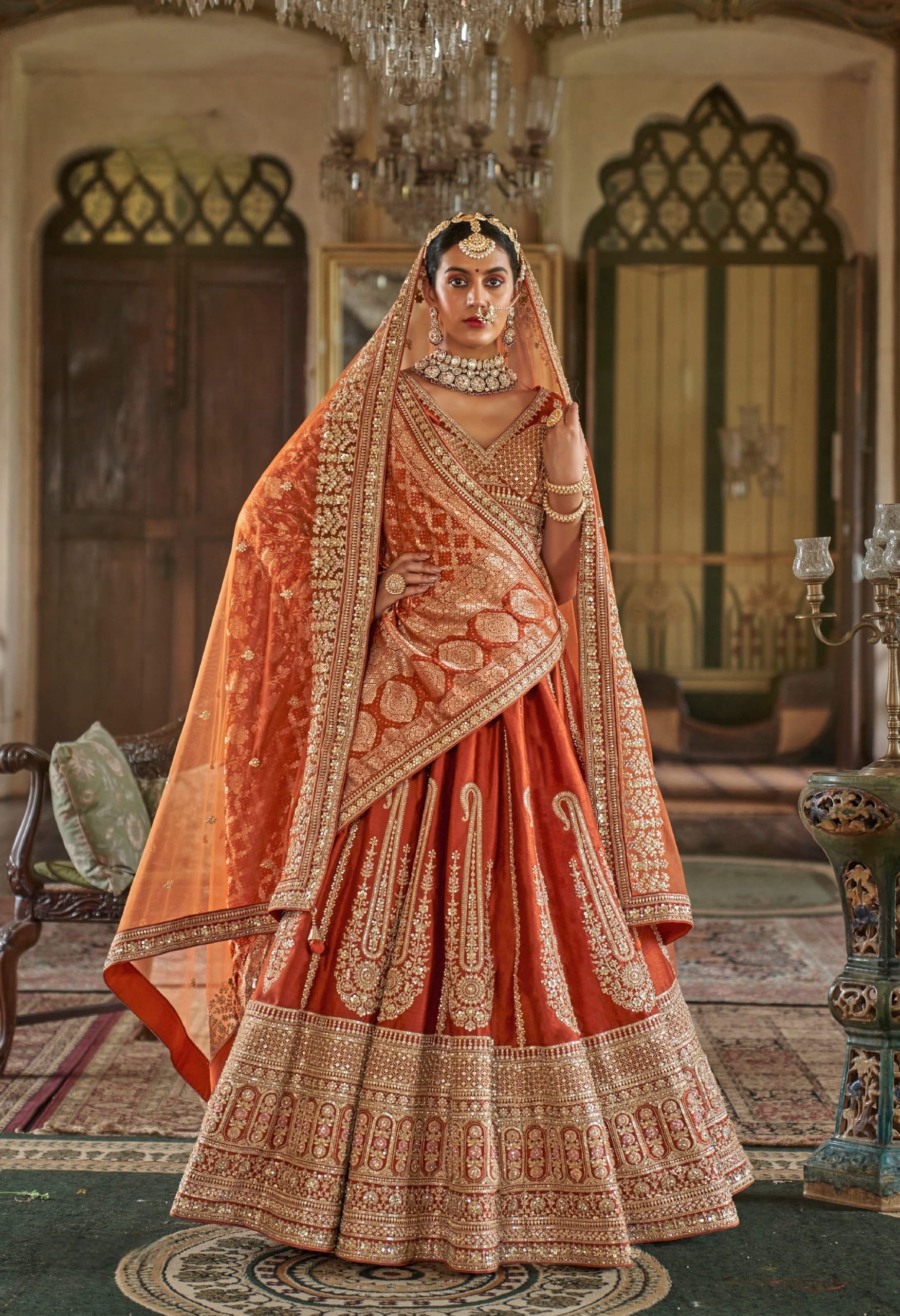 Orange bridal lehenga with zari embroidery and double dupatta