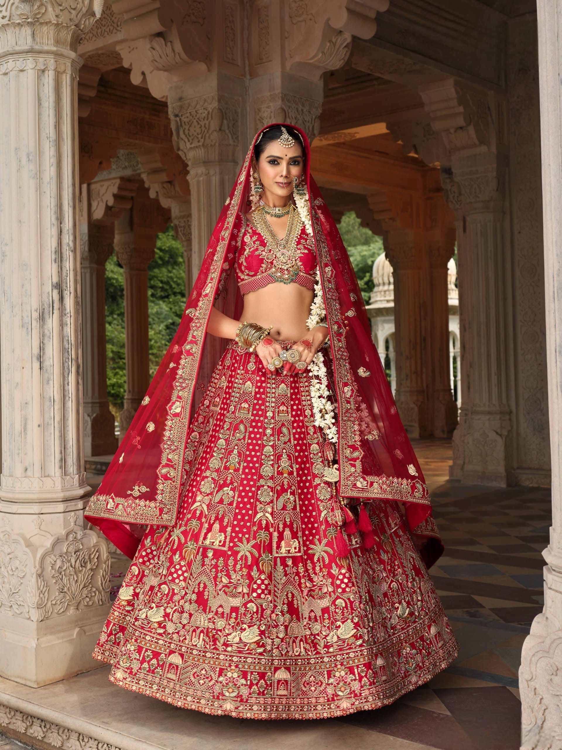 Regal Red Bridal Lehenga with Temple Motifs and Zari Embroidery