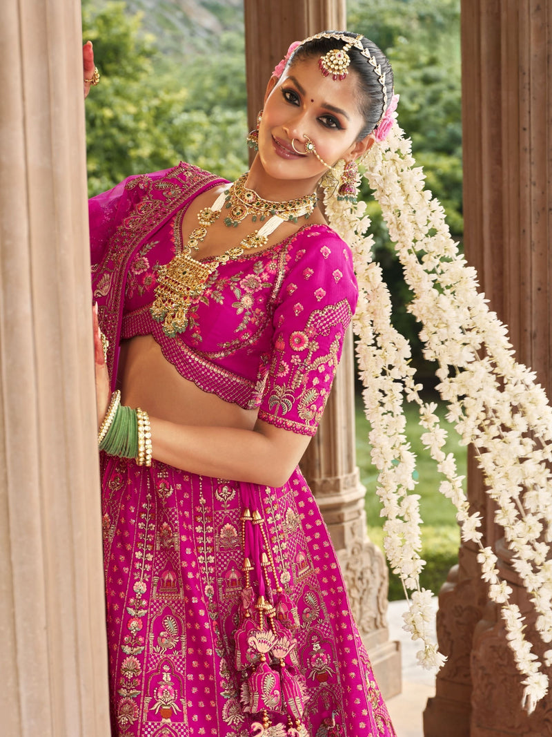Luxury Wedding Lehenga in Pink with Temple and Floral Motifs