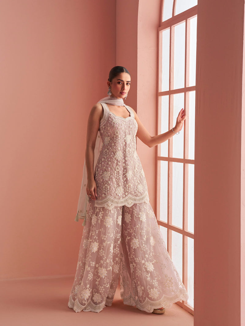Dusty pink net embroidered sharara suit with halter neck