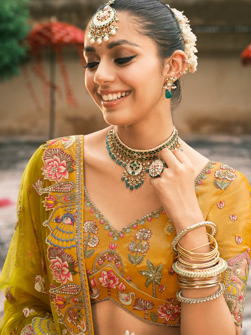 Yellow Bridal Lehenga with Temple Embroidery & Mirror Work