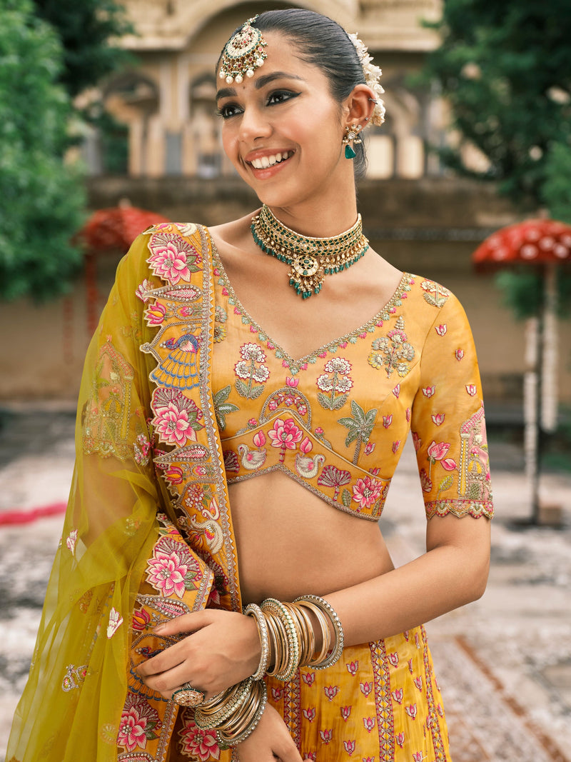 Yellow Bridal Lehenga with Temple Embroidery & Mirror Work