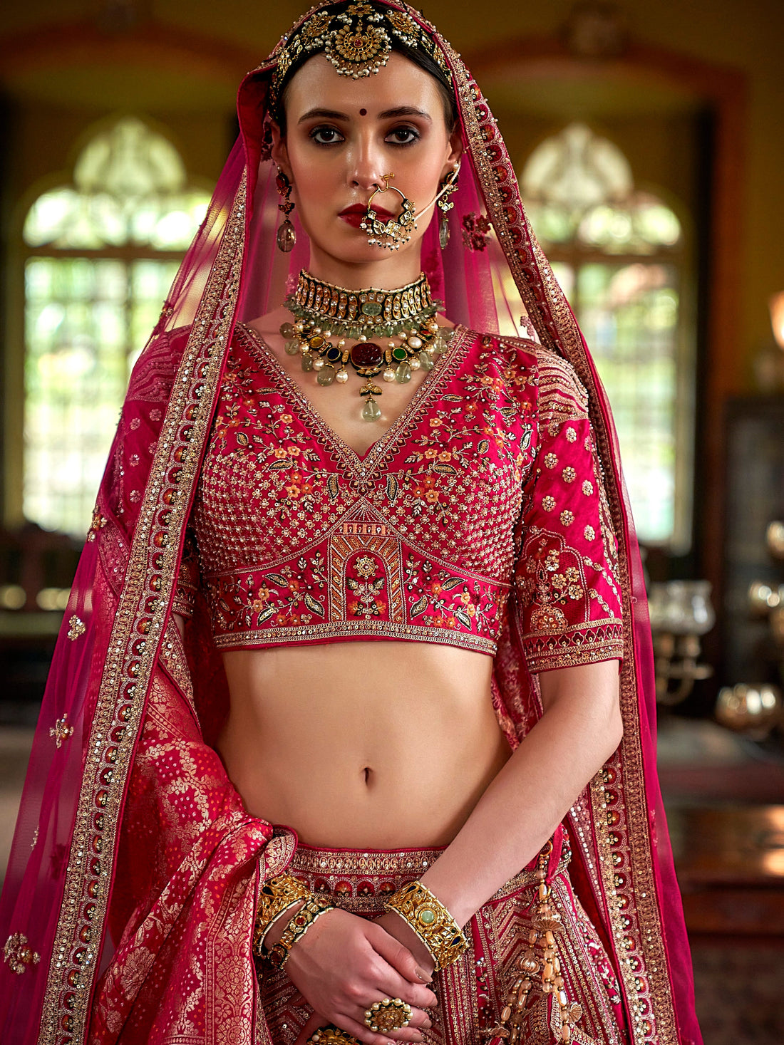 Pink bridal lehenga with pearls, zari weaving and 5 meter flair