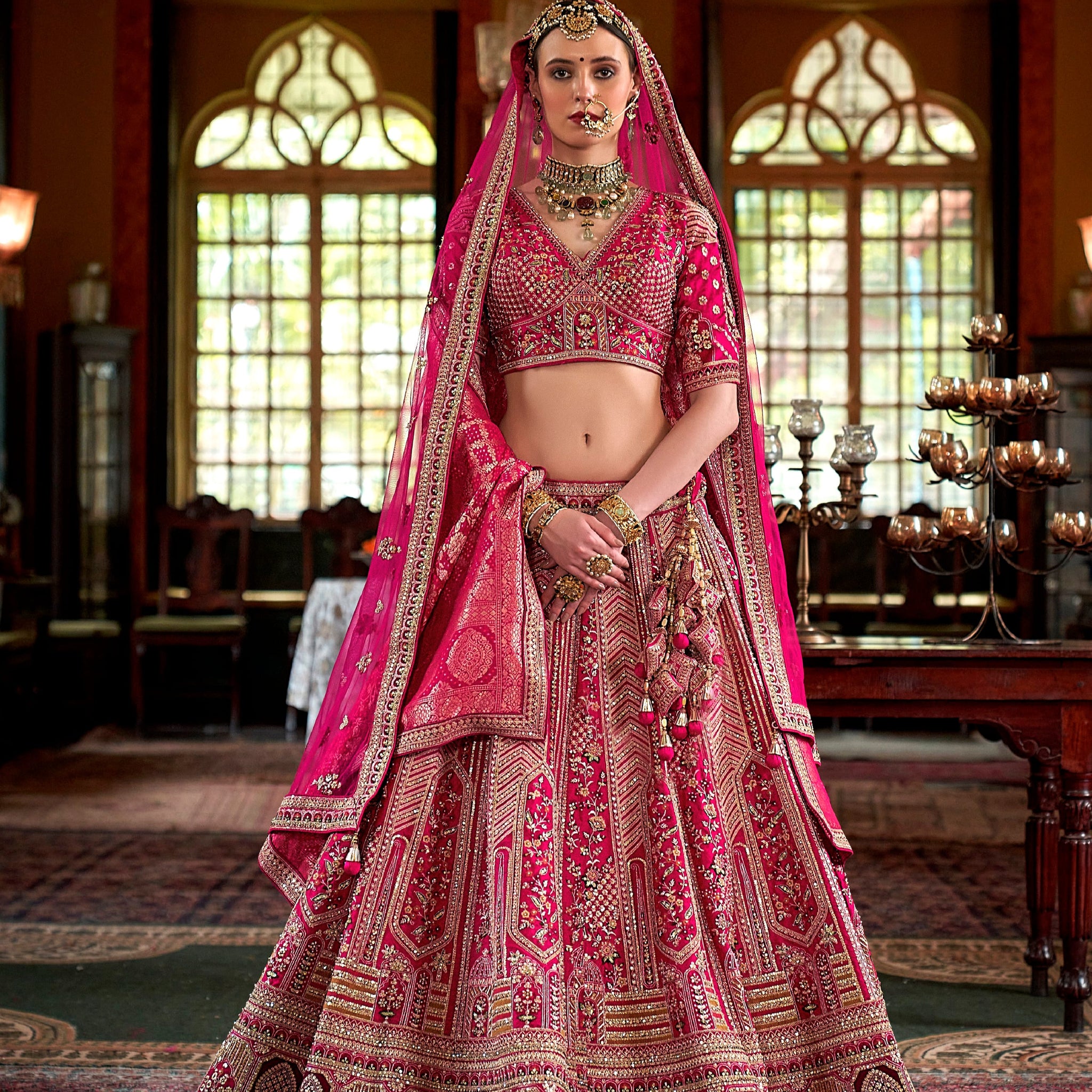 Pink bridal lehenga with pearls, zari weaving and 5 meter flair