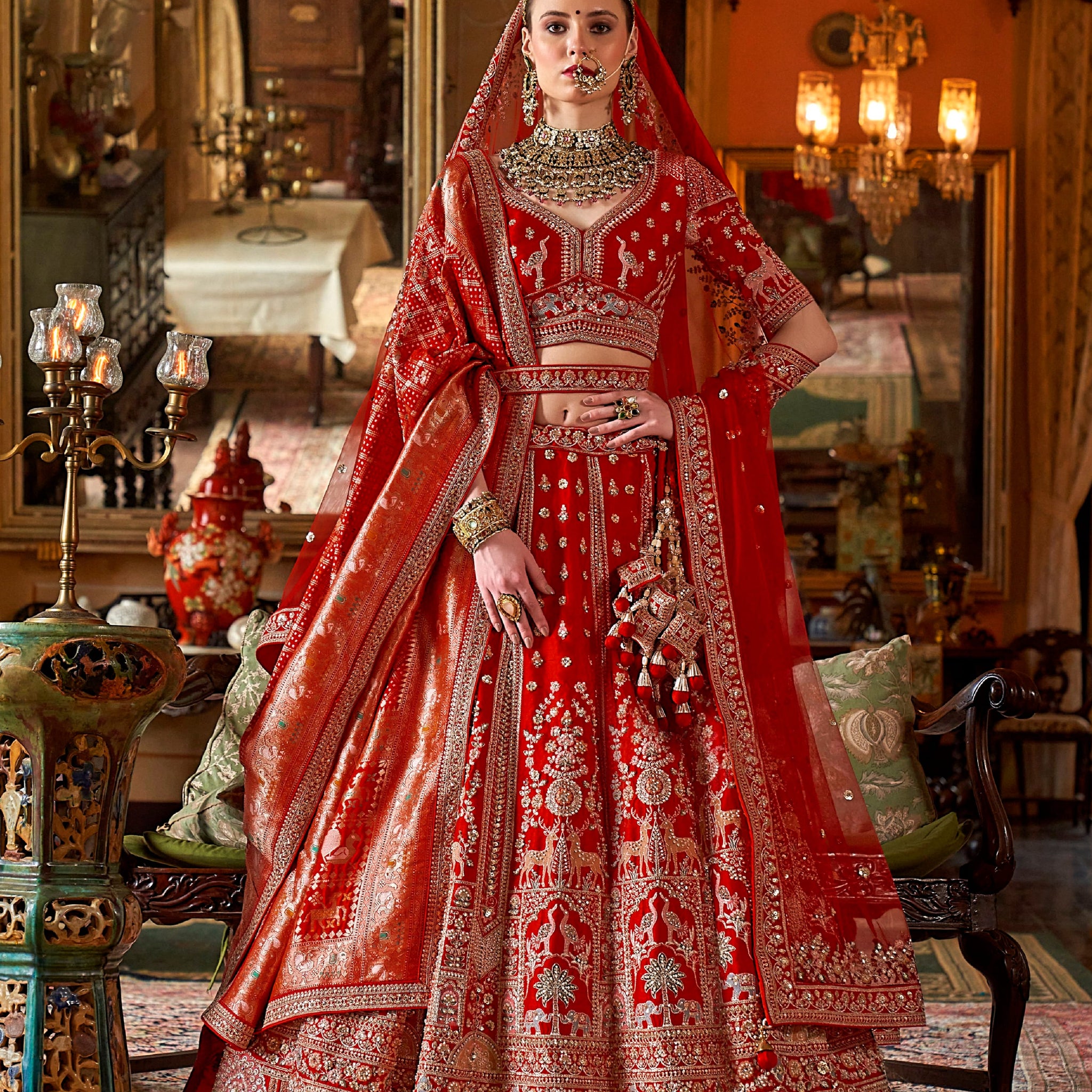 Heavy embroidered red wedding lehenga with sequins and pearls