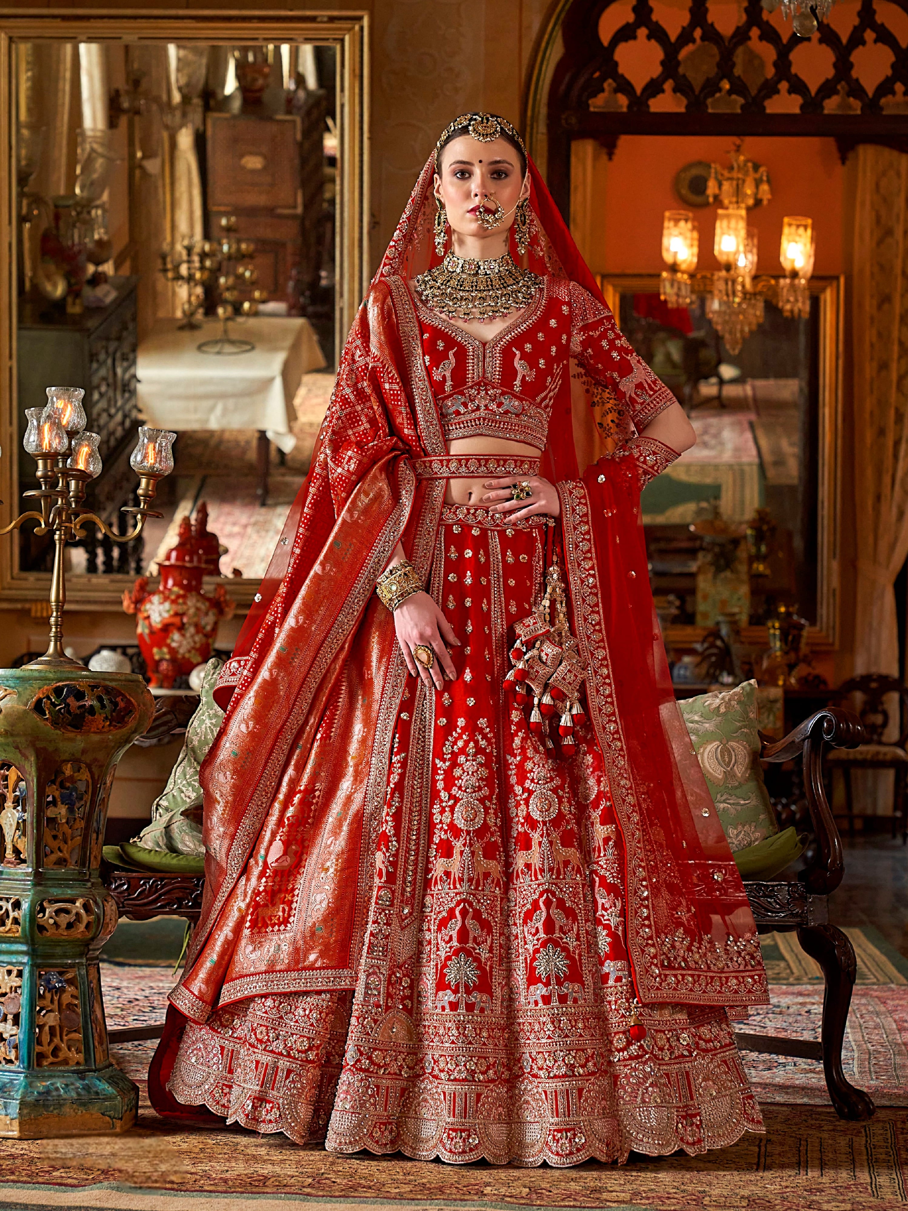 Heavy embroidered red wedding lehenga with sequins and pearls