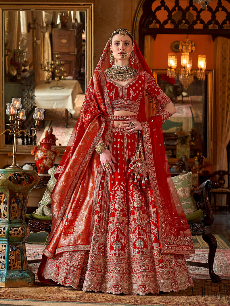 Heavy embroidered red wedding lehenga with sequins and pearls