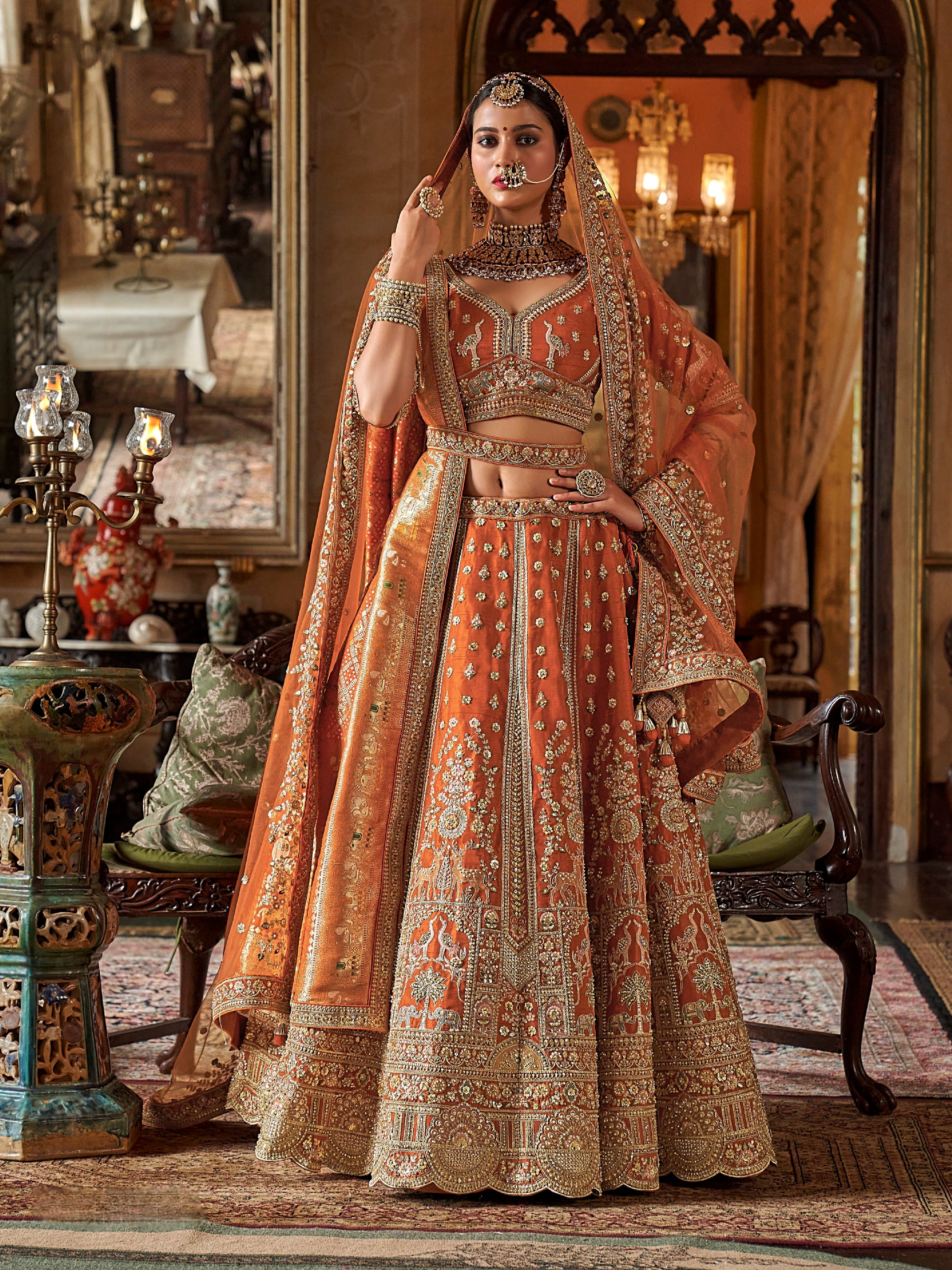 Elegant orange silk bridal lehenga with embroidery work