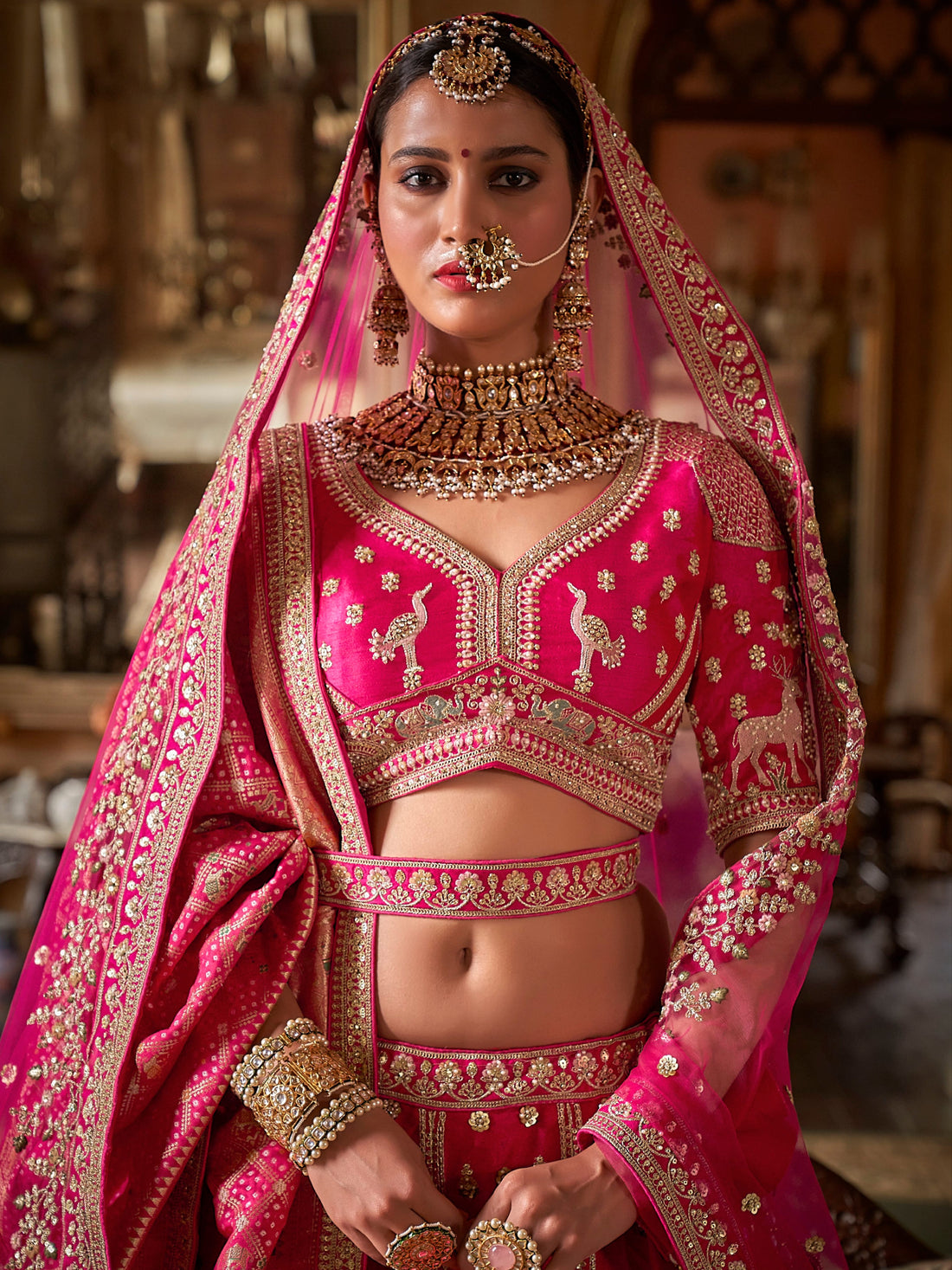 Hot pink bridal silk lehenga with sequins embroidery
