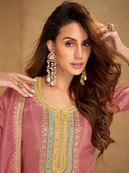 Designer mauve embroidered suit for festive wear