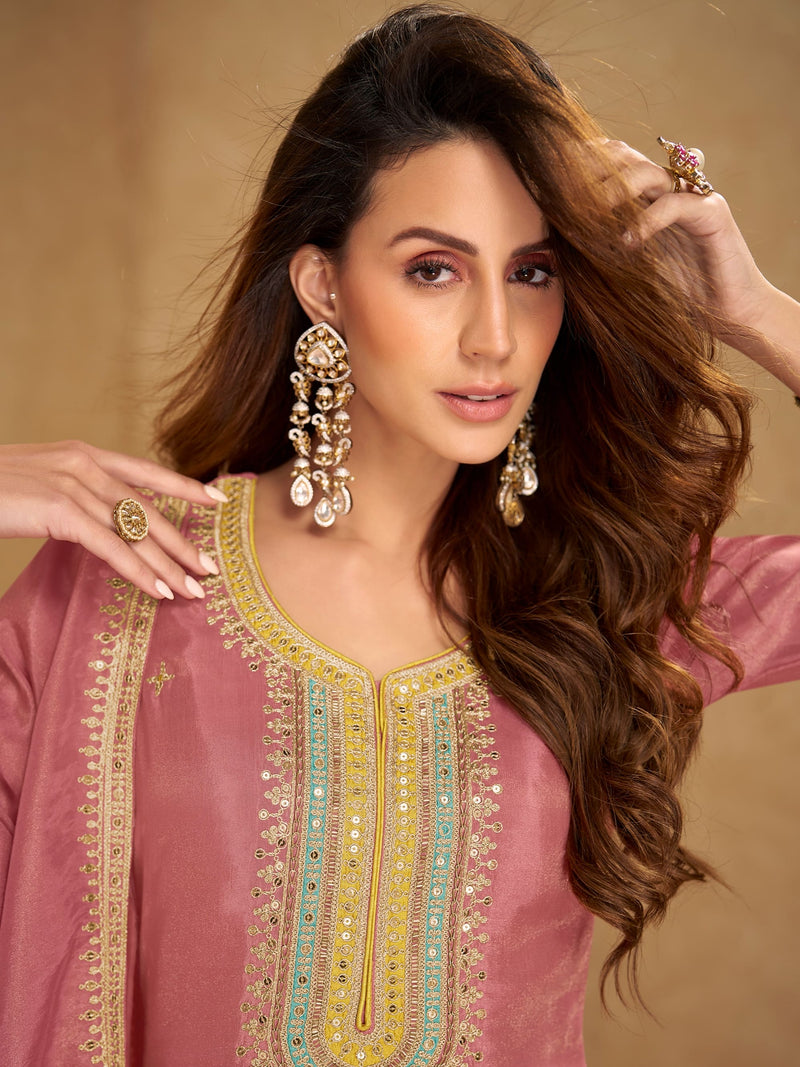 Designer mauve embroidered suit for festive wear