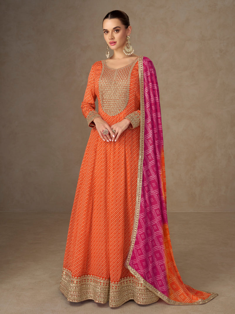 Orange Anarkali suit with pink dupatta for wedding wear