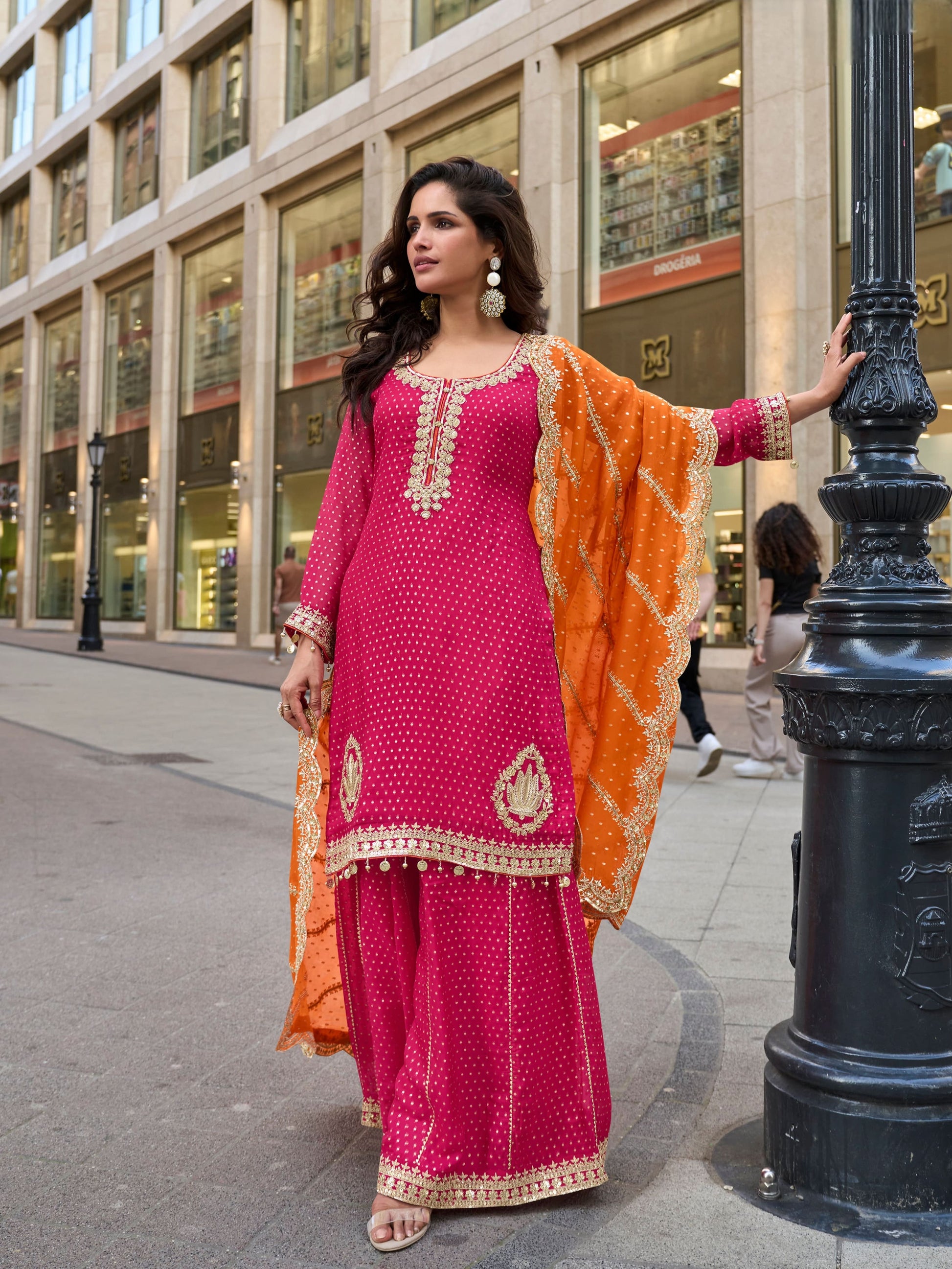 Traditional Indian pink sharara dress with heavy embroidery