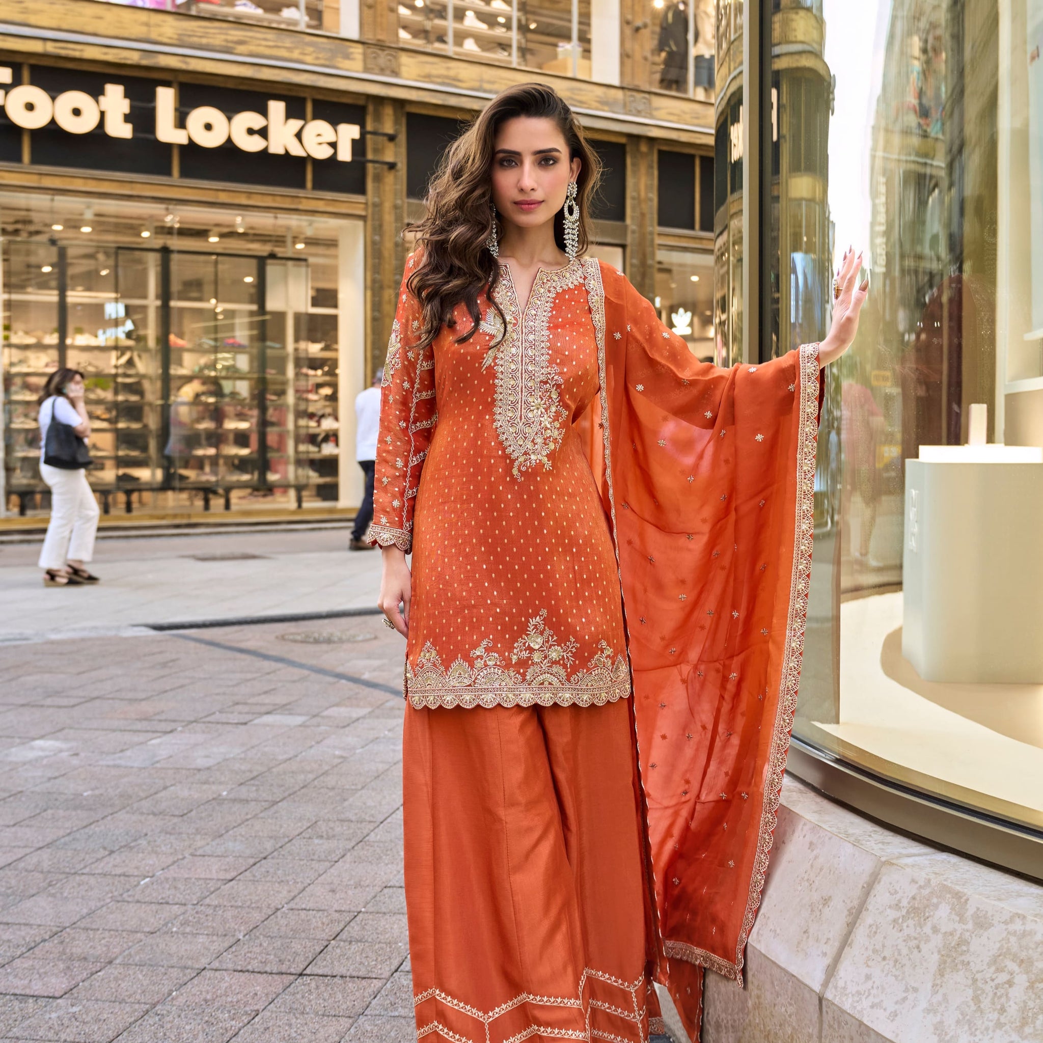 Orange embroidered sharara suit in jacquard silk fabric