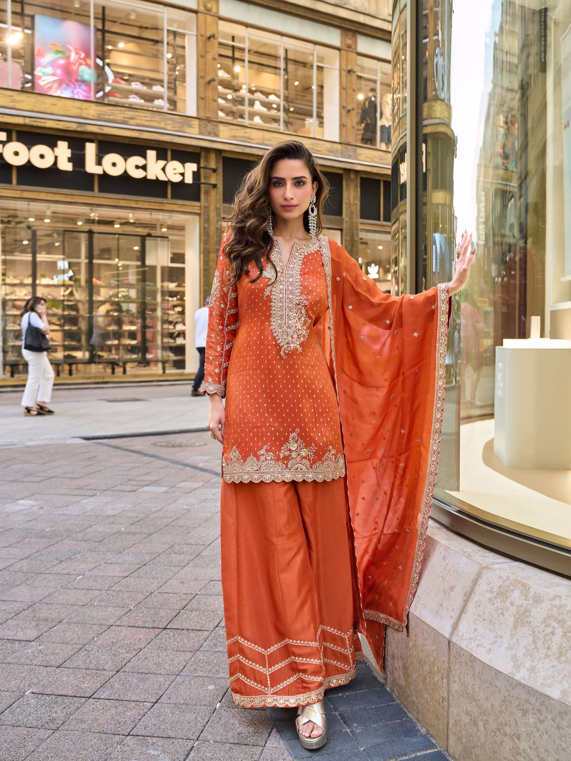 Orange embroidered sharara suit in jacquard silk fabric
