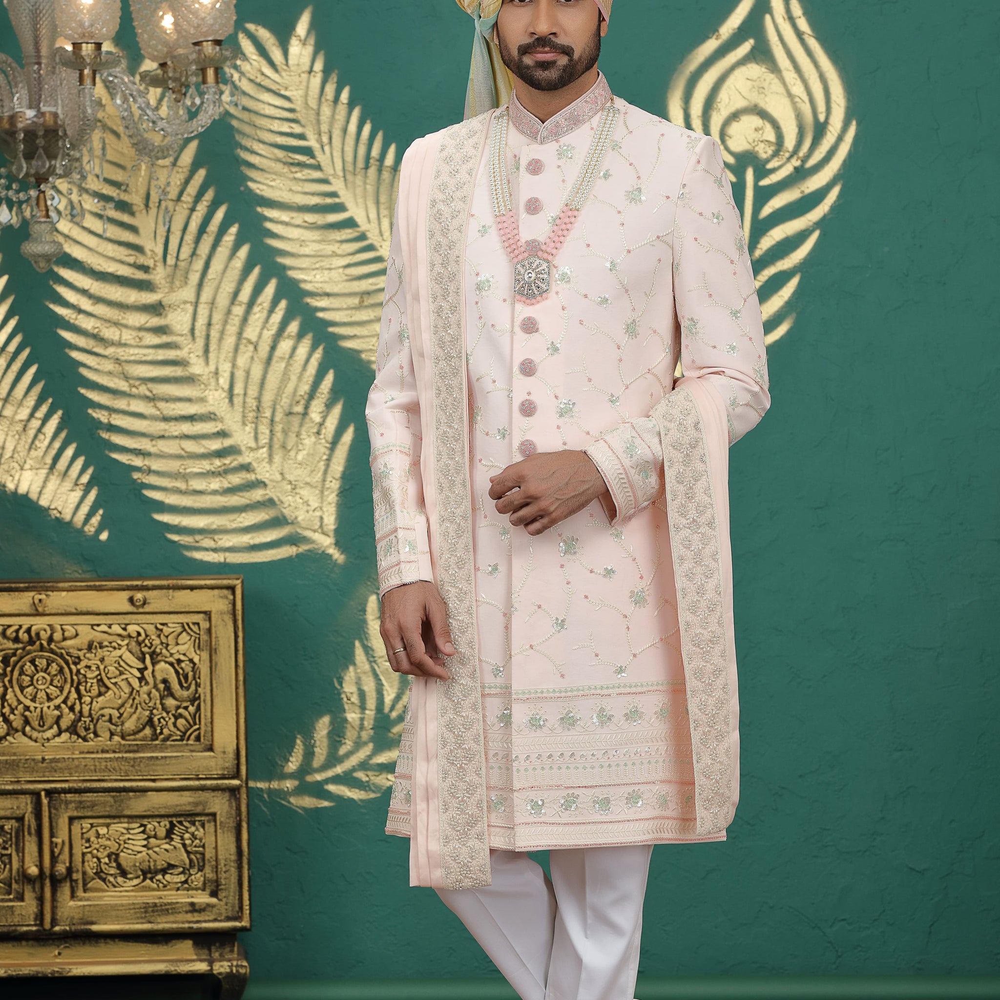 Blush pink embroidered sherwani for groom with Aligadhi pants