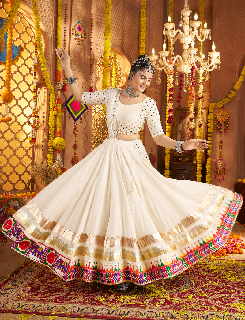 Gujarati style white chaniya choli with heavy embroidery