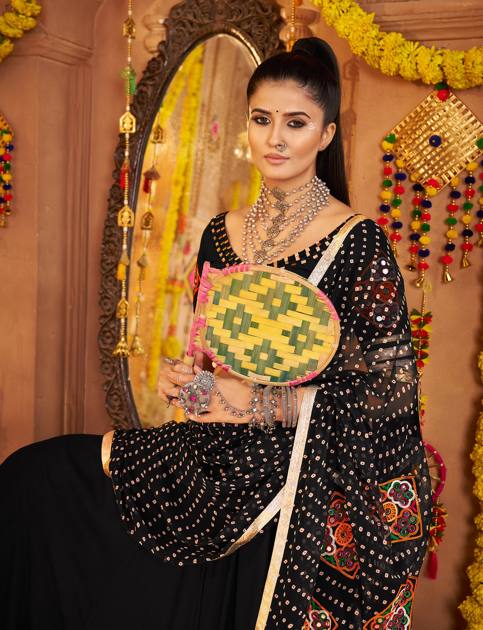 Gujarati black chaniya choli with heavy mirror and thread embroidery