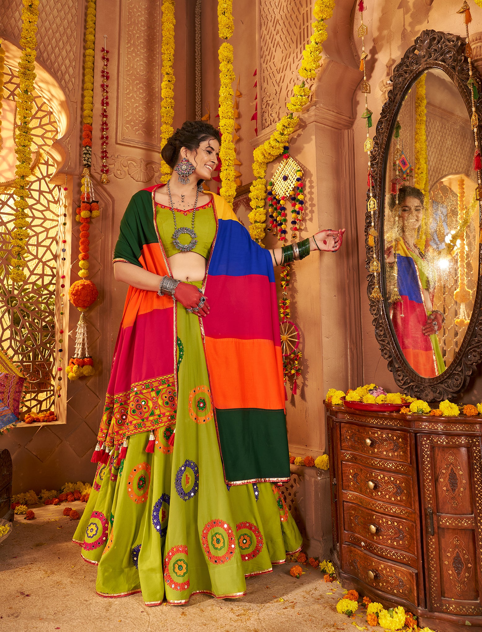 Bottle green mirror work chaniya choli for Navratri garba
