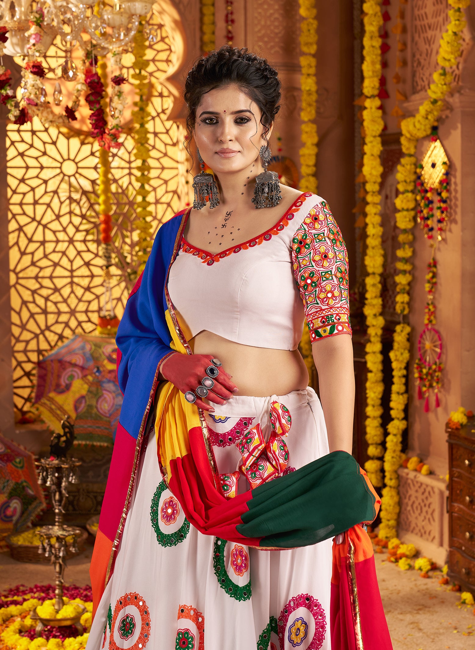 Traditional white chaniya choli with heavy mirror embroidery