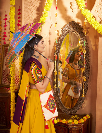 Gujarati style yellow mirror work chaniya choli with dupatta