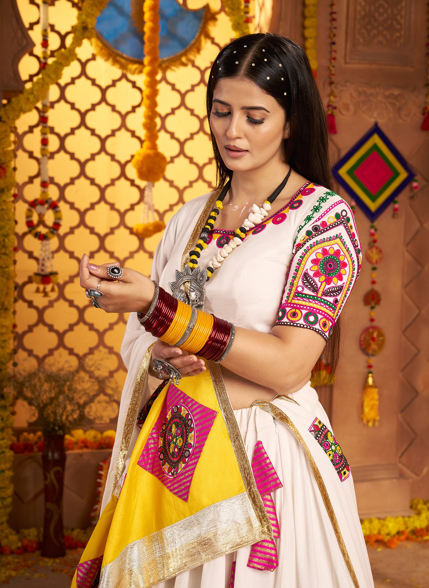Latest white mirror work chaniya choli for festive wear
