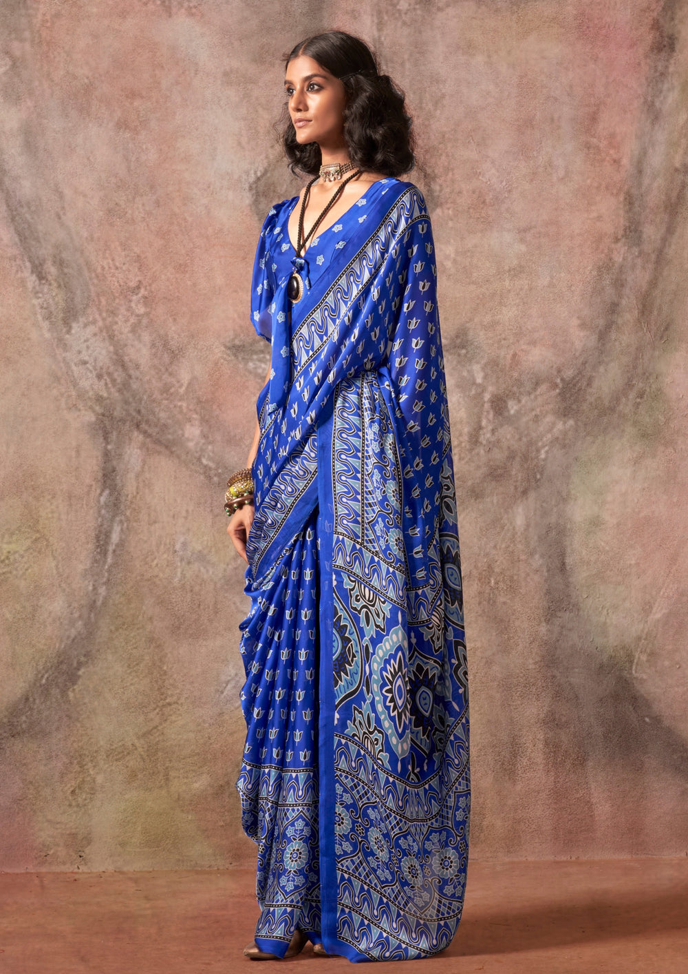 Blue Raisins Ajrakh Printed Satin Georgette Silk Saree 