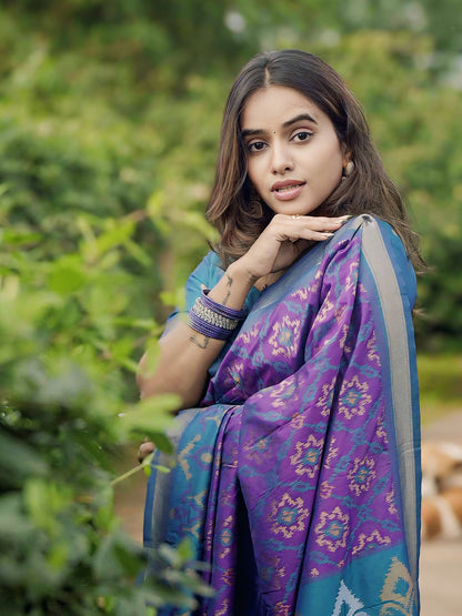 Rupali in our Purple Soft Silk Zari Woven Patola Saree Banarasi Saree Anant Tex Exports Pvt.Ltd..