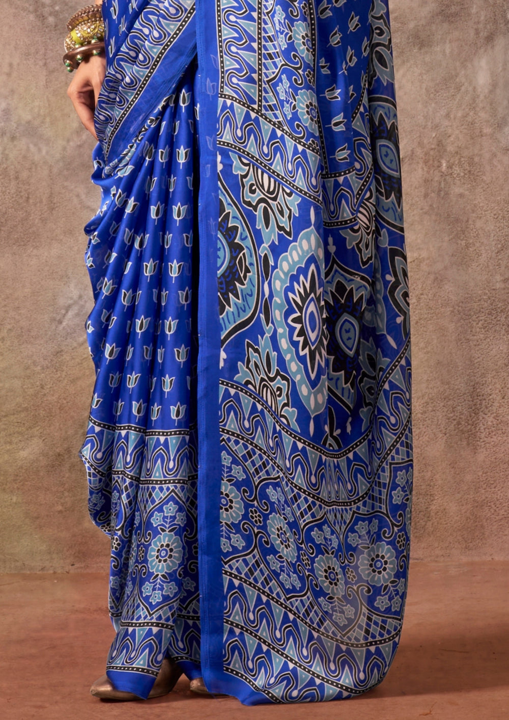 Blue Raisins Ajrakh Printed Satin Georgette Silk Saree 