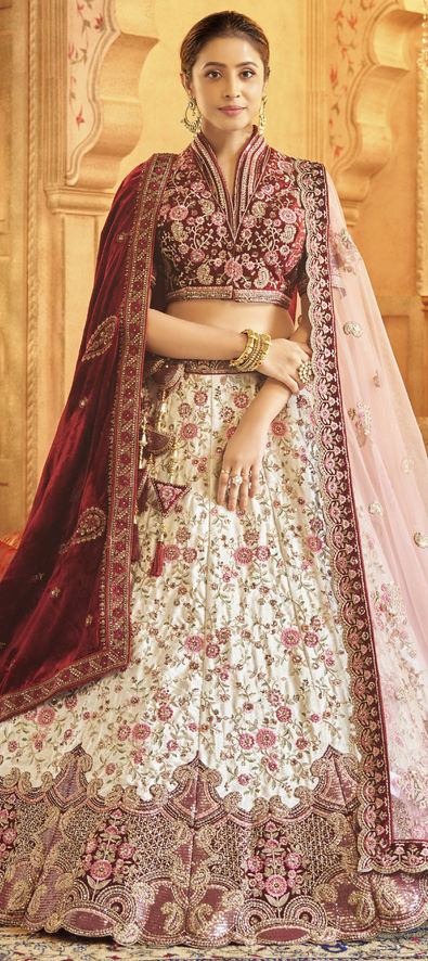 Beautiful Designer Bridal Velvet Wedding Lehenga in White and Off White with Sequence work