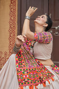 Kutchi work dupatta with white lehenga

